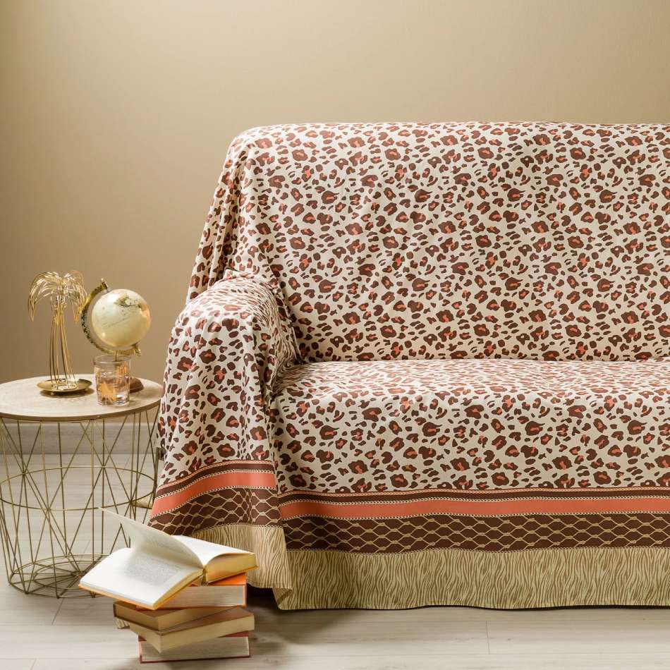 Telo Arredo Grandecor multiuso Leopard di Caleffi, in puro cotone. Fantasia leopardata con bordo a contrasto. Colore arancio. Ideale come copriletto, copritavolo e copridivano. Misura matrimoniale.