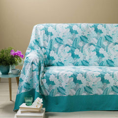 Telo Arredo multiuso Orchidea di Caleffi, in puro cotone. Telo grandecor misura matrimoniae. Utilizzabile come copriletto, copridivano o copritavolo. Fantasia con fiori e foglie colore anice avio azzurro