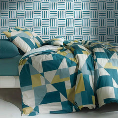 Trapunta invernale Gabel Newton in puro cotone per letto singolo.   Fantasia geometrica colore giada (con forme verdi, azzurre e petrolio).
