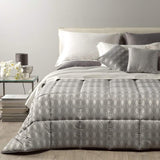 Trapunta invernale matrimoniale Caleffi Nuit in prezioso raso jacquard. Fantasia geometrica colore grigio