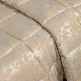 Trapunta invernale matrimoniale Caleffi Angel in raso jacquard. Fantasia floreale colore beige.