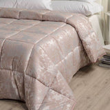 Trapunta invernale matrimoniale Caleffi Angel in raso jacquard. Fantasia floreale colore rosa.