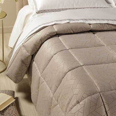 Trapunta invernale matrimoniale Caleffi Atelier in raso jacquard. Fantasia geometrica colore caffè marrone dorato