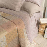 Trapuntino matrimoniale Caleffi Green Village in puro cotone. Fantasia patchwork floreale colore naturale arancio