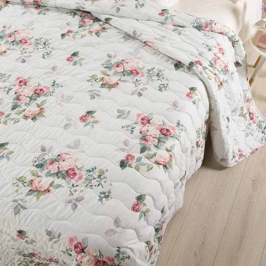 Trapuntino Caleffi Botticelli in microfibra per letto singolo e matrimoniale. Romantica fantasia floreale con rose su fondo chiaro.