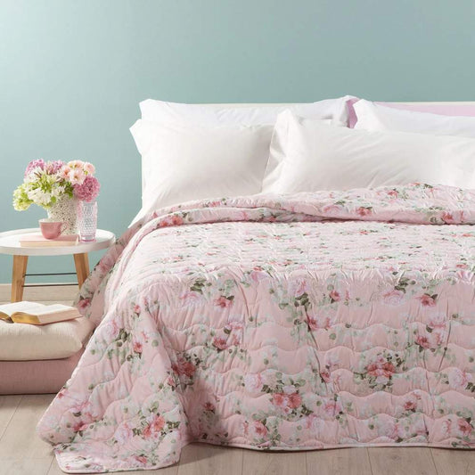 Trapunta primaverile Caleffi Flores in microfibra, per letto singolo e matrimoniale. Romantica fantasia floreale con rose su fondo rosa