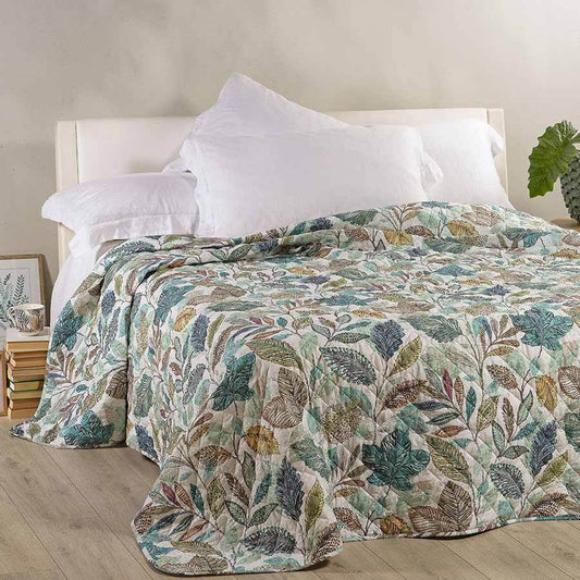 Trapuntino matrimoniale Caleffi Botanical in puro cotone con stampa digitale. Fantasia con fiori sui toni dell'azzurro e del verde acqua su fondo chiaro.