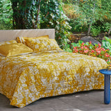 Trapuntino matrimoniale Fazzini Kimono in percalle di cotone. Fantasia floreale con fiori bianchi su fondo giallo senape. Collezione primavera estate