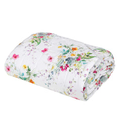 Trapuntino matrimoniale Fazzini Joy in percalle di cotone. Fantasia floreale con fiori colorati su fondo bianco. Collezione primavera estate 2021.